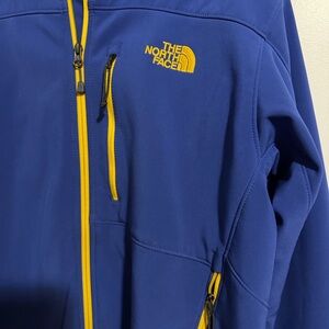 The North Face Blue Jacket with Yellow Accents